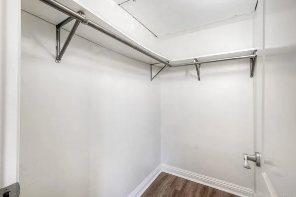 a view of a room with rack on the wall