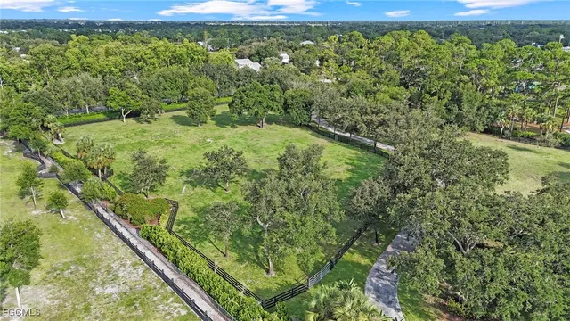 a view of a yard with an outdoor seating