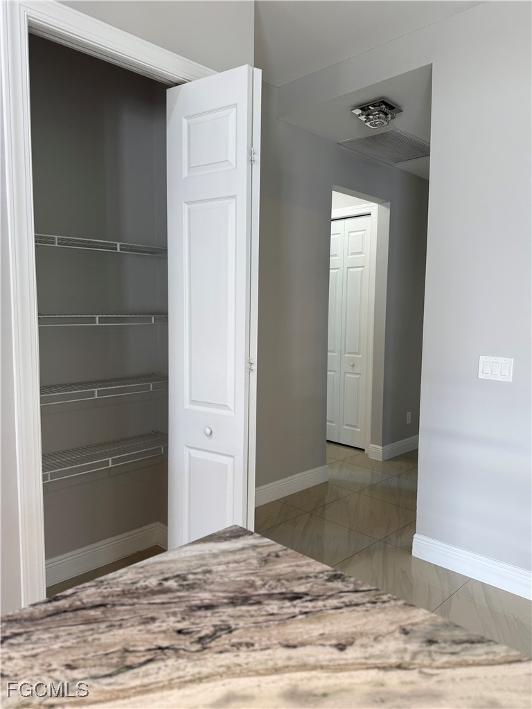 3013 4th Street West Lehigh Acres, FL 33971 - Photo 19 of 47 a view of a wooden door