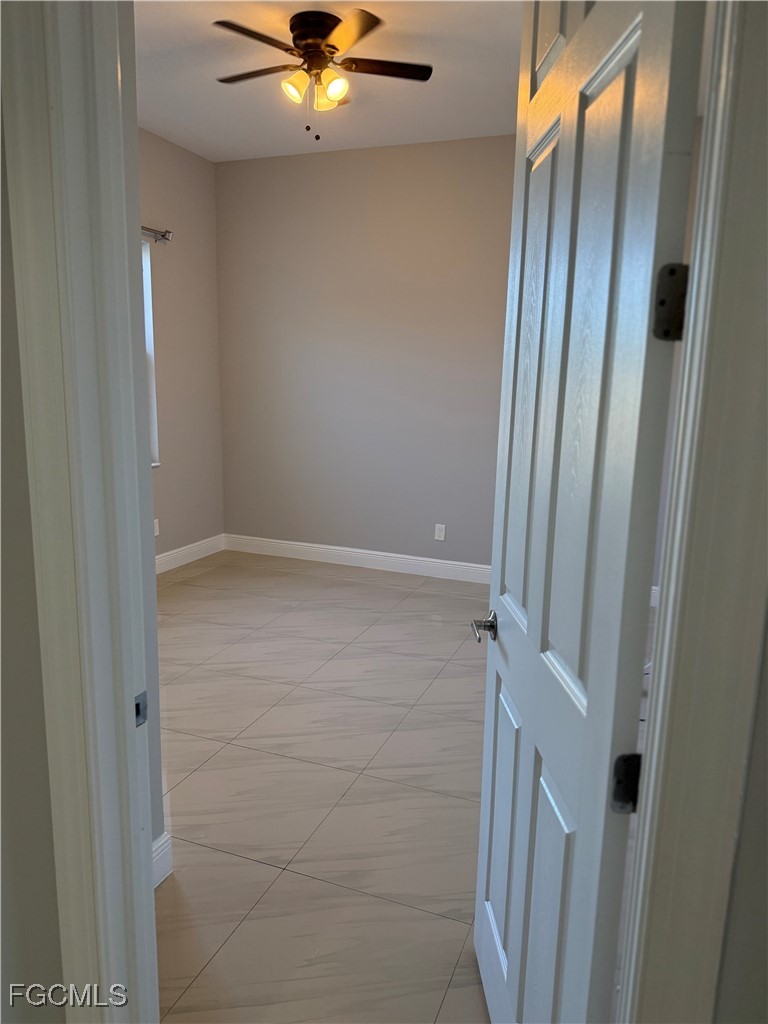 3013 4th Street West Lehigh Acres, FL 33971 - Photo 21 of 47 a view of a hallway