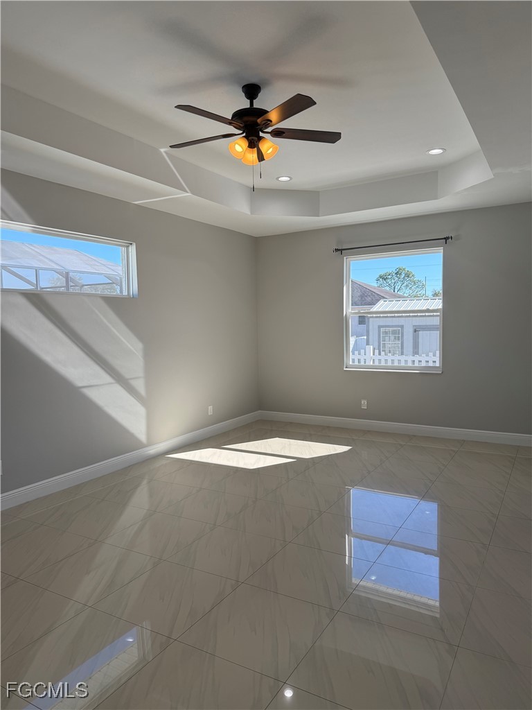 3013 4th Street West Lehigh Acres, FL 33971 - Photo 29 of 47 a view of an empty room with a window