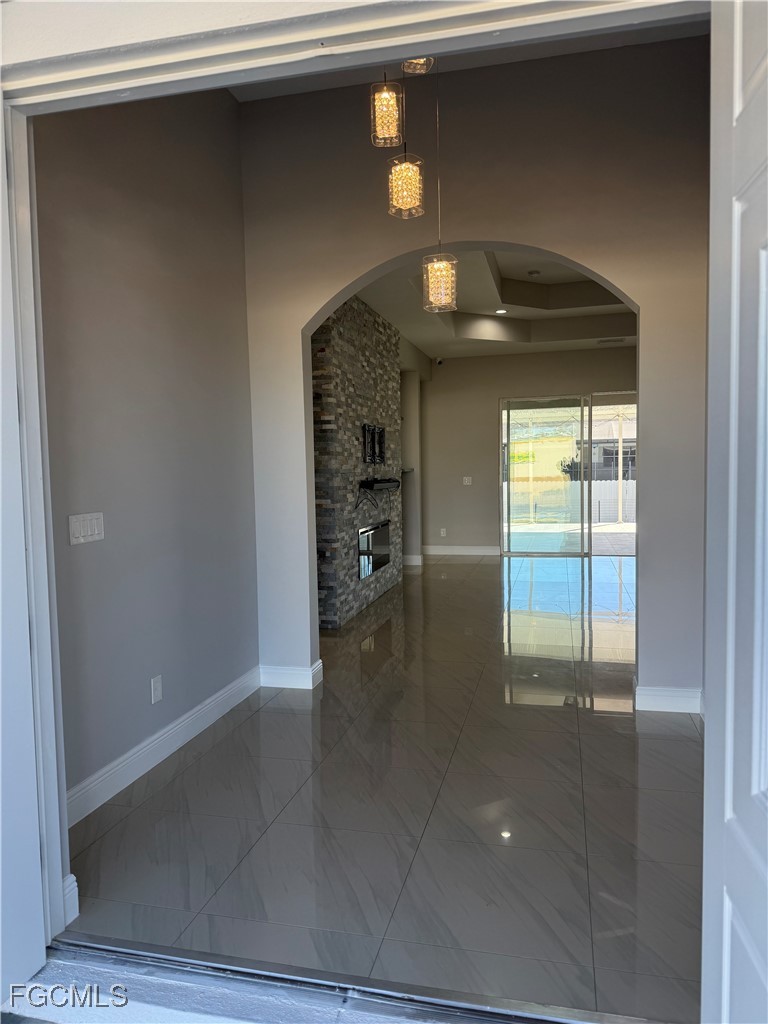 3013 4th Street West Lehigh Acres, FL 33971 - Photo 3 of 47 a view of a living room with a fireplace