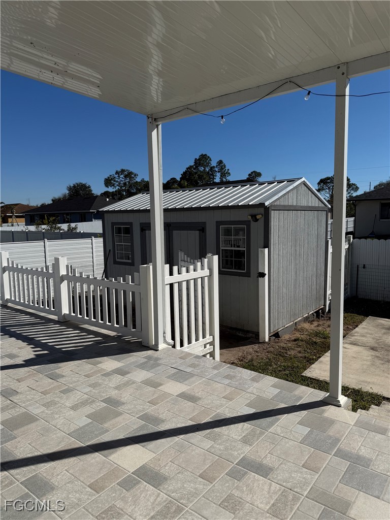 3013 4th Street West Lehigh Acres, FL 33971 - Photo 43 of 47 a front view of a house with a porch