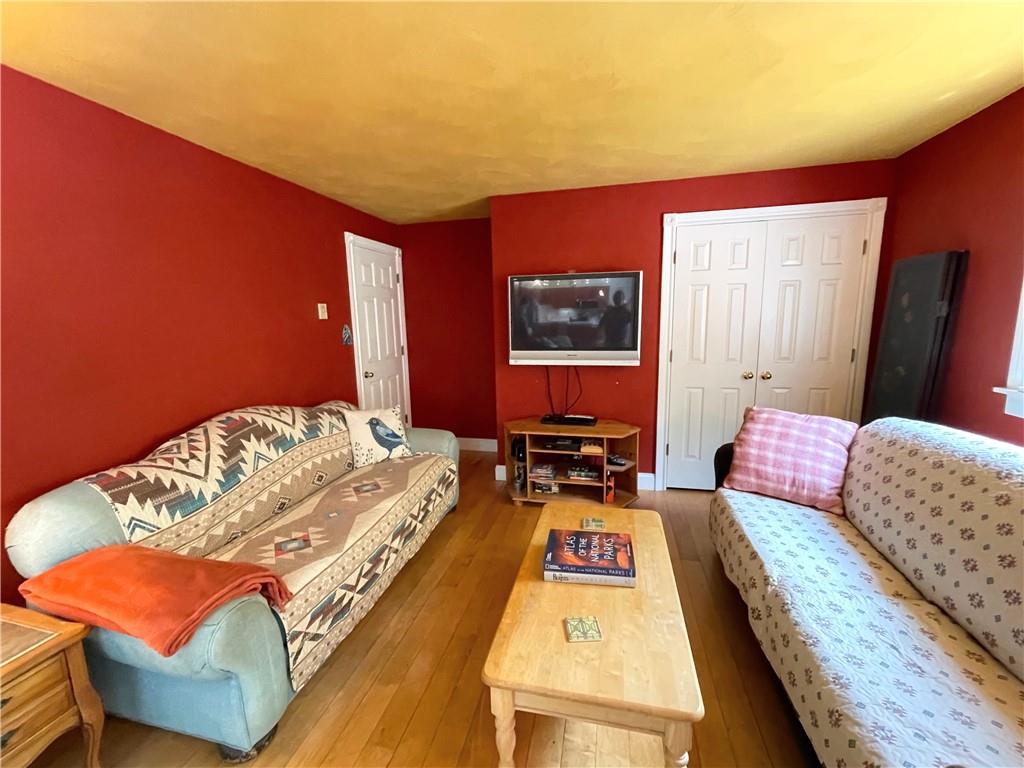 740 Four Mile Run Road Ligonier, PA 15658 - Photo 9 of 12 a bedroom with furniture and a bed