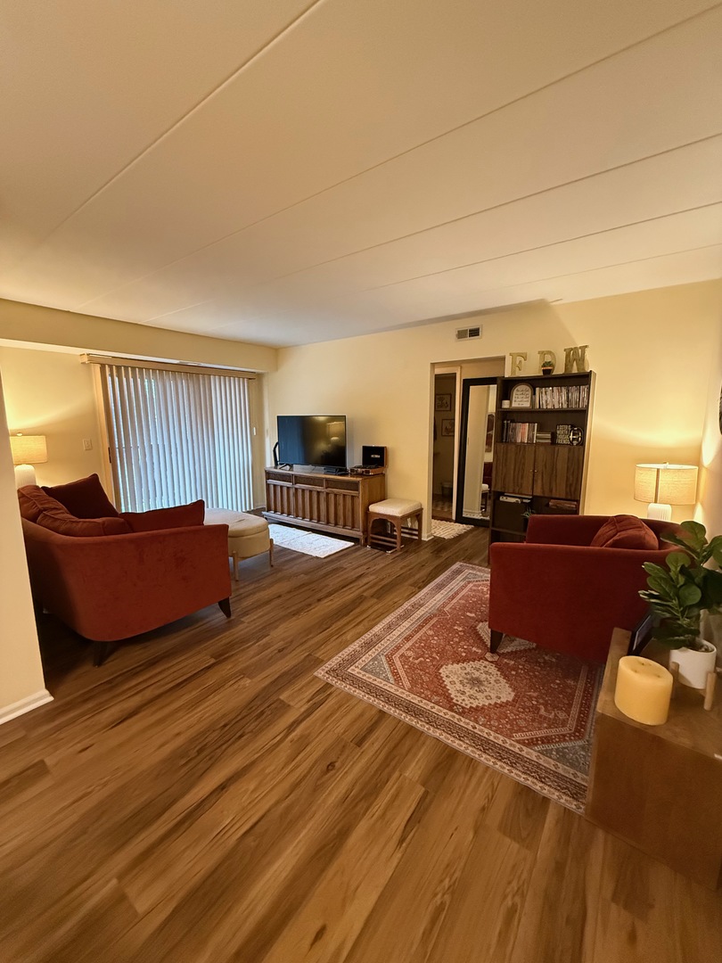 18135 Martin Avenue, Unit 2SW Homewood, IL 60430 - Photo 6 of 18 a living room with a couch and a coffee table