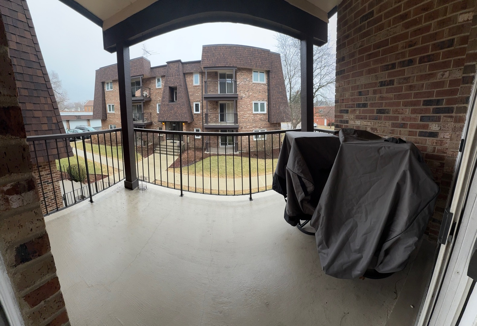 18135 Martin Avenue, Unit 2SW Homewood, IL 60430 - Photo 9 of 18 a view of a balcony with furniture