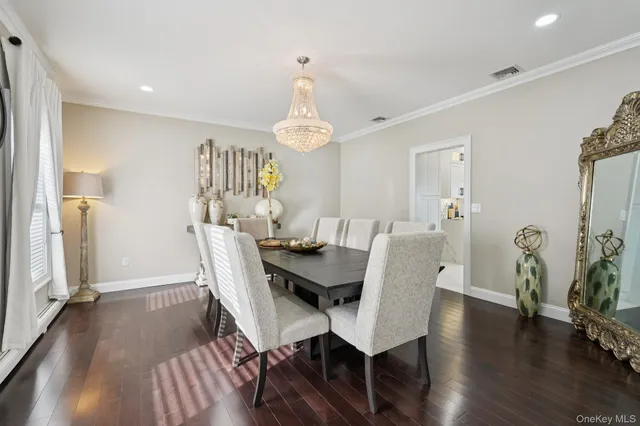 a white bath tub sitting in front of a bathroom