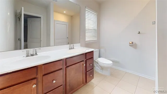 a room with furniture and mirror