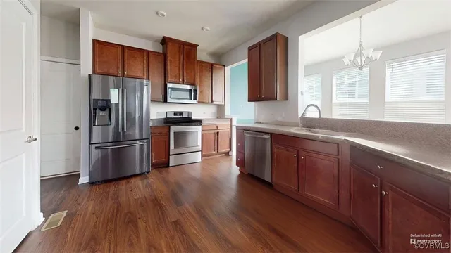 a picture of a table and chairs in a patio
