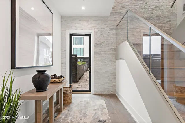 a bathroom with a sink a mirror and shower