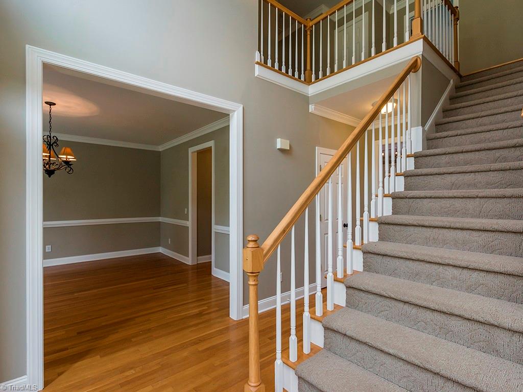 8302 Case Ridge Drive Oak Ridge, NC 27310 - Photo 3 of 29 Open flow to dining room, kitchen or living room.