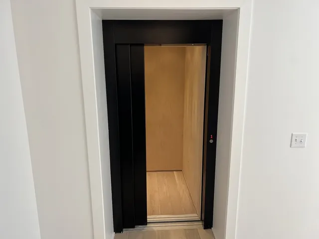 a view of a kitchen with a sink and a stove top oven