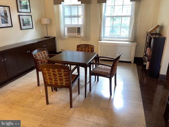 2737 Devonshire Place Northwest, Unit 327 Washington, DC 20008 - Photo 14 of 16 a dining room with furniture and window