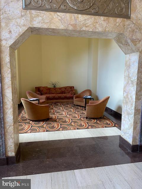 2737 Devonshire Place Northwest, Unit 327 Washington, DC 20008 - Photo 16 of 16 a bench sitting in middle of a room