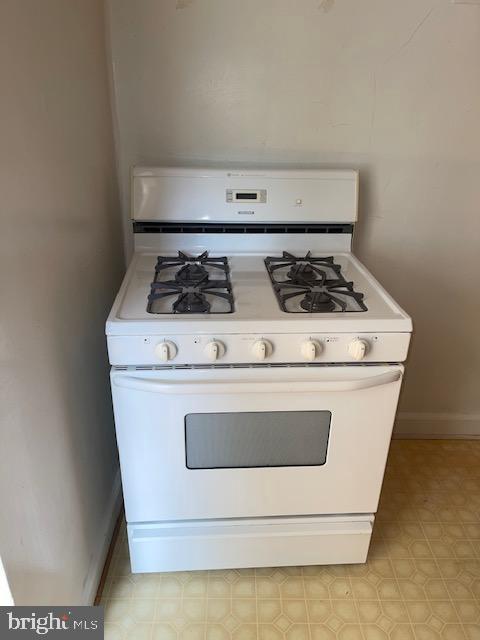 2737 Devonshire Place Northwest, Unit 327 Washington, DC 20008 - Photo 8 of 16 a stove top oven sitting inside of a kitchen