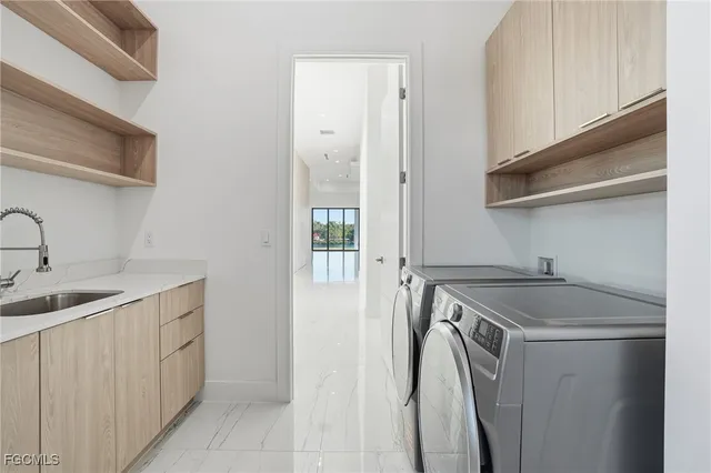 a view of a room with a ceiling fan