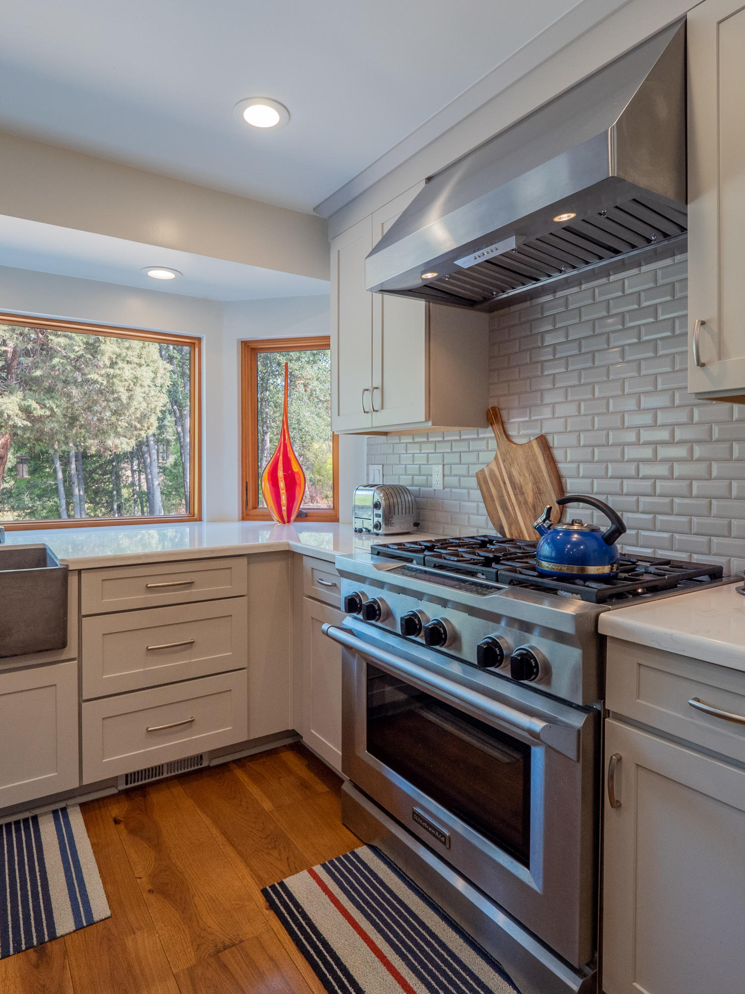 37600 Vedder Road Burney, CA 96013 - Photo 17 of 69 a stove top oven sitting inside of a kitchen