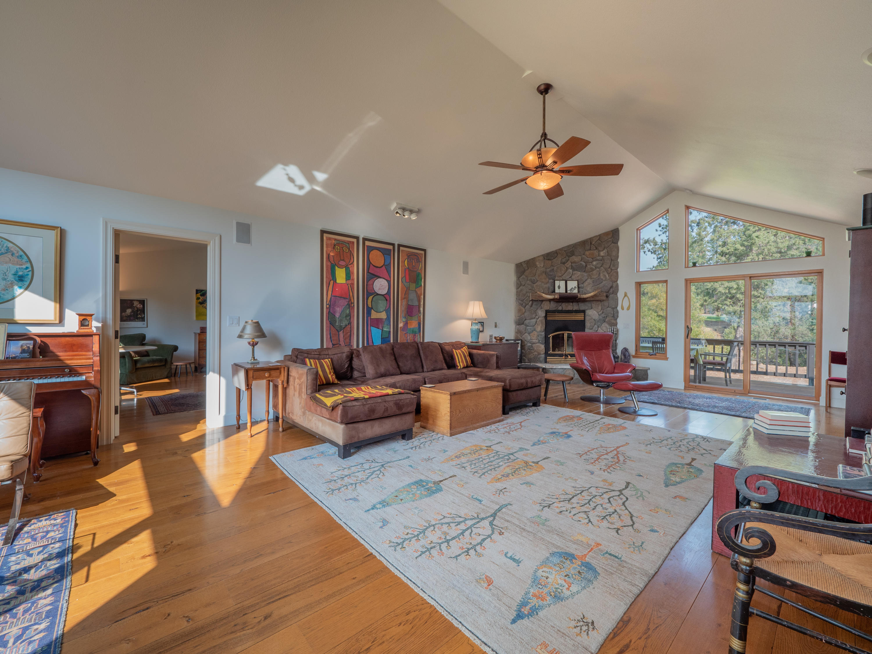 37600 Vedder Road Burney, CA 96013 - Photo 8 of 69 a living room with furniture a chandelier and a table