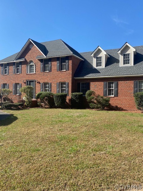 18630 Templeton Road Disputanta, VA 23842 - Photo 1 of 41 a front view of a house with swimming pool