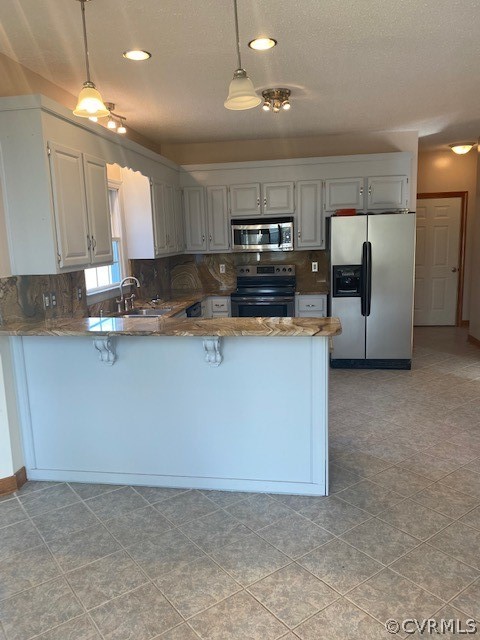 18630 Templeton Road Disputanta, VA 23842 - Photo 13 of 41 a kitchen with stainless steel appliances a refrigerator sink and microwave