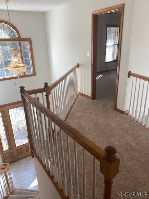 18630 Templeton Road Disputanta, VA 23842 - Photo 16 of 41 a view of staircase with railing and a rug
