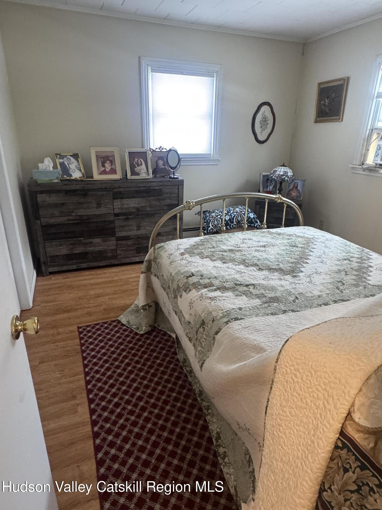 107 Route 40 Road Hensonville, NY 12439 - Photo 13 of 22 a bedroom with bed and window