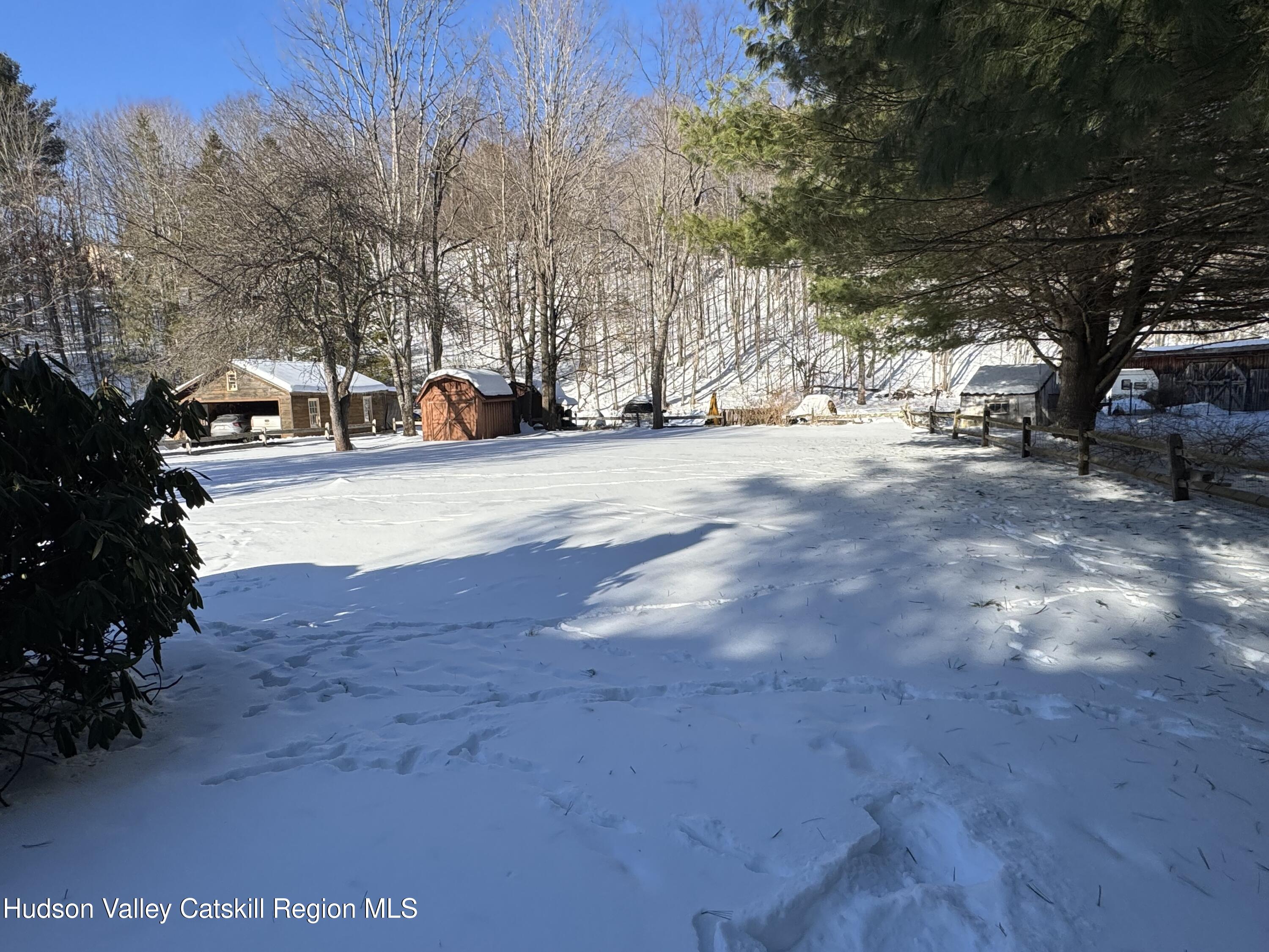 107 Route 40 Road Hensonville, NY 12439 - Photo 19 of 22 a street view covered with snow