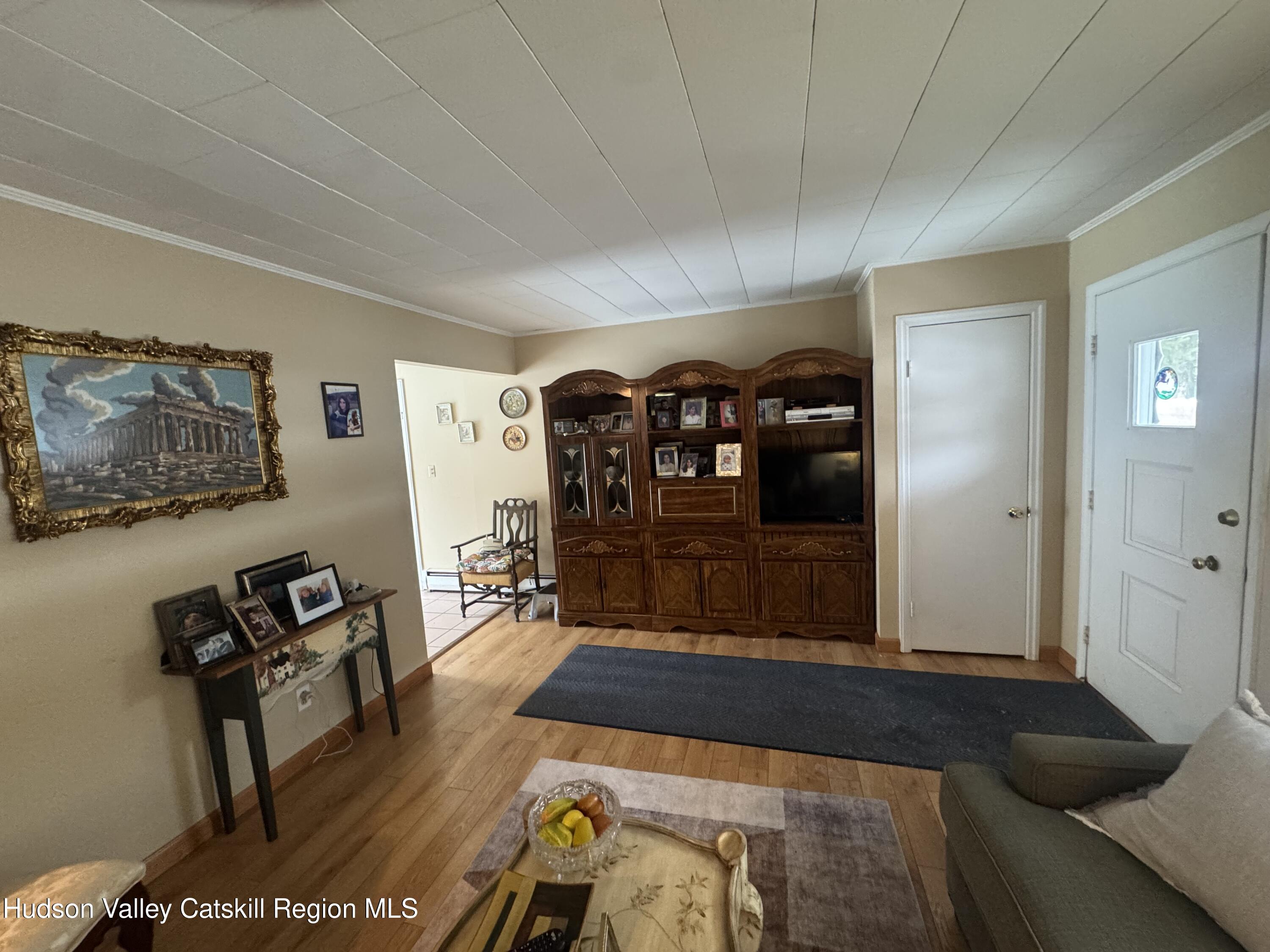 107 Route 40 Road Hensonville, NY 12439 - Photo 4 of 22 a living room with furniture and a wooden floor