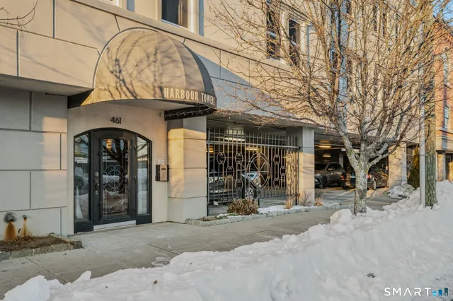 a front view of a building with glass windows