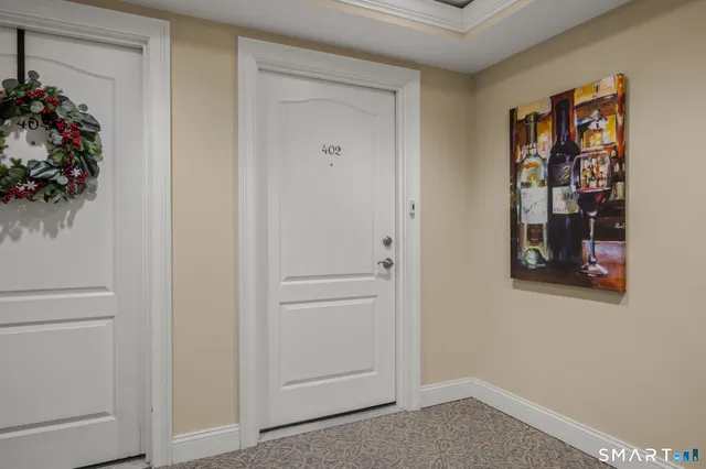 a view of a hallway with closet