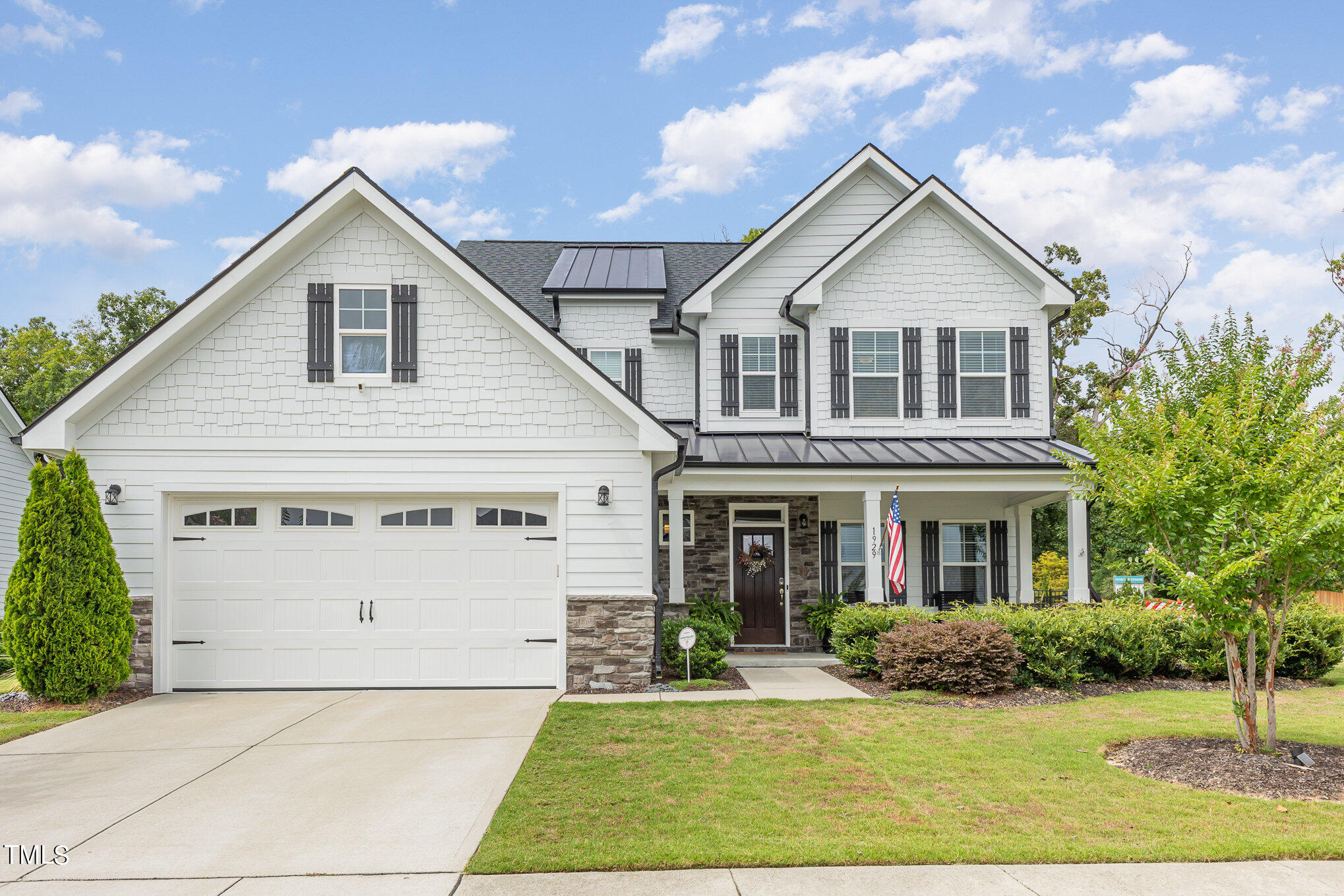 1929 Edens Ridge Avenue Wake Forest, NC 27587 - Photo 1 of 26 a front view of a house with a yard