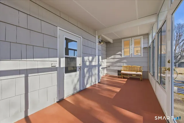 a view of an empty room and window