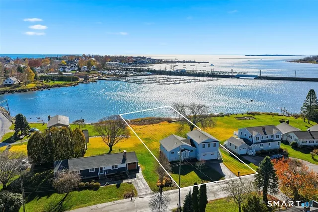 a view of a swimming pool and an outdoor seating