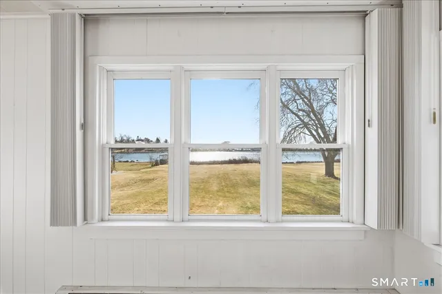 a view of a room that has a window