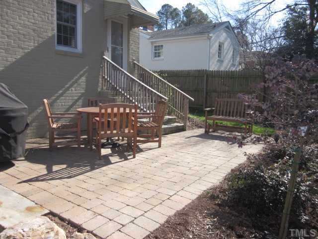 Enjoy the extra outdoor living space this wonderful cobble stone patio has to offer! Great space for a cookout with family & friends! Beautiful landscaping throughout private back yard! Patio/Deck