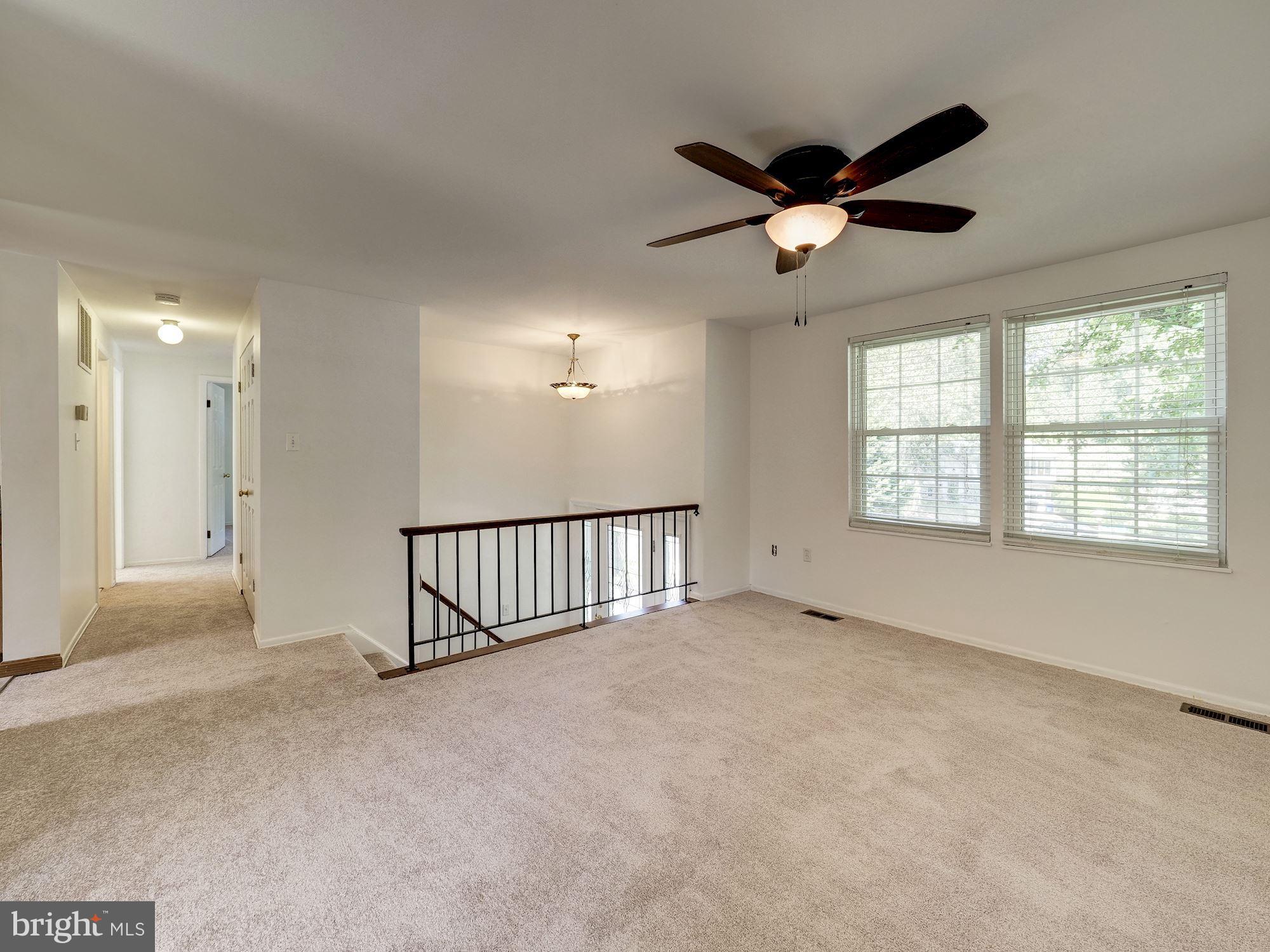 15420 Valencia Street Silver Spring, MD 20905 - Photo 2 of 31 Sun filled living room