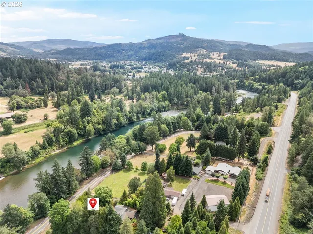 a view of a city and mountains ocean view