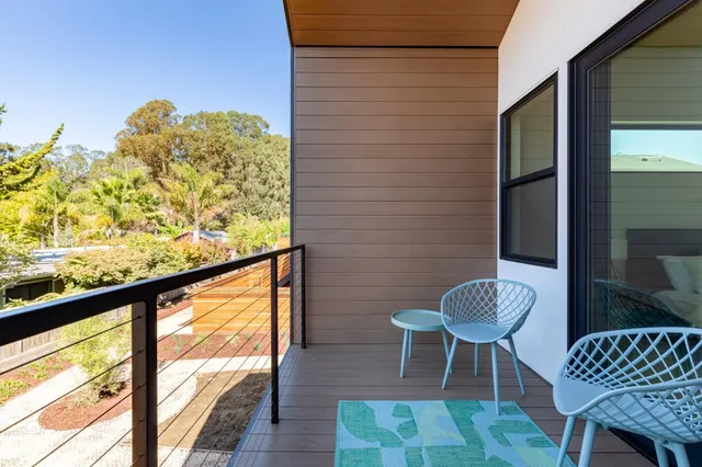 a view of front door with wooden floor