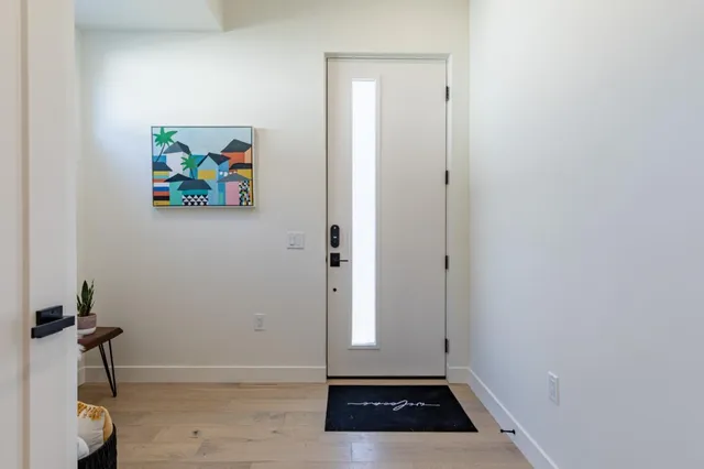 a view of a kitchen with a sink
