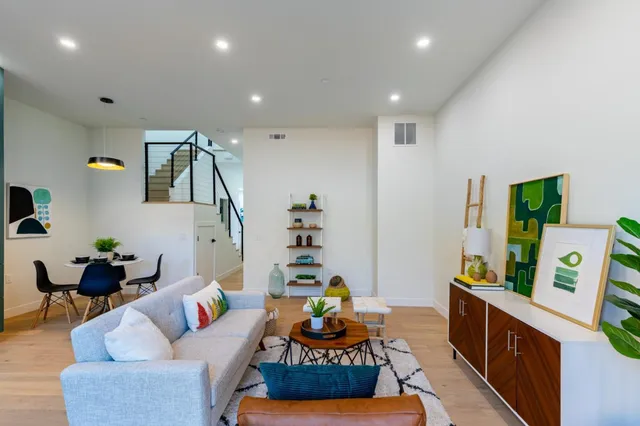 a living room with furniture and a couch