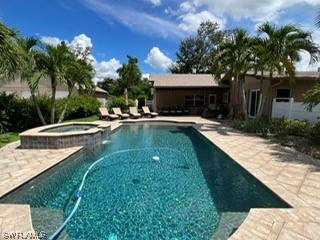 1337 Bradford Road Fort Myers, FL 33901 - Photo 2 of 46 a view of a house with swimming pool