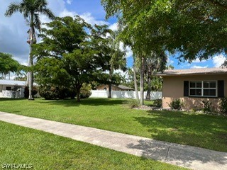 1337 Bradford Road Fort Myers, FL 33901 - Photo 8 of 46 a front view of a house with garden