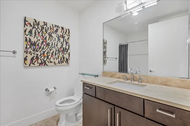 a bathroom with a sink and a toilet