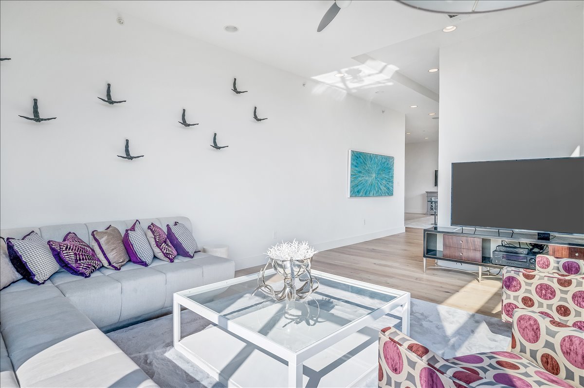 1101 Ivean Pearson Road, Unit A102 Lago Vista, TX 78645 - Photo 3 of 31 Living area with wood finished floors