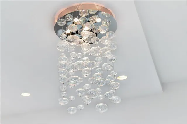 a close view of a chandelier in a bathroom