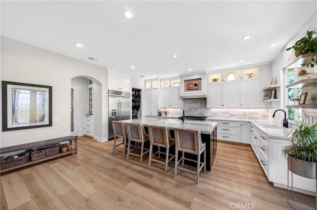 16375 Ory Circle Riverside, CA 92503 - Photo 13 of 51 a large kitchen with a table and chairs in it
