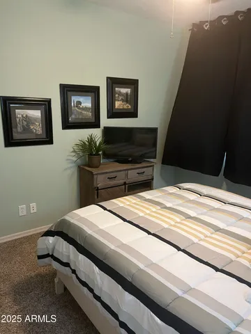 a bathroom with a shower and a tub