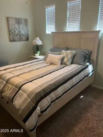 a bathroom with a toilet and a bathtub