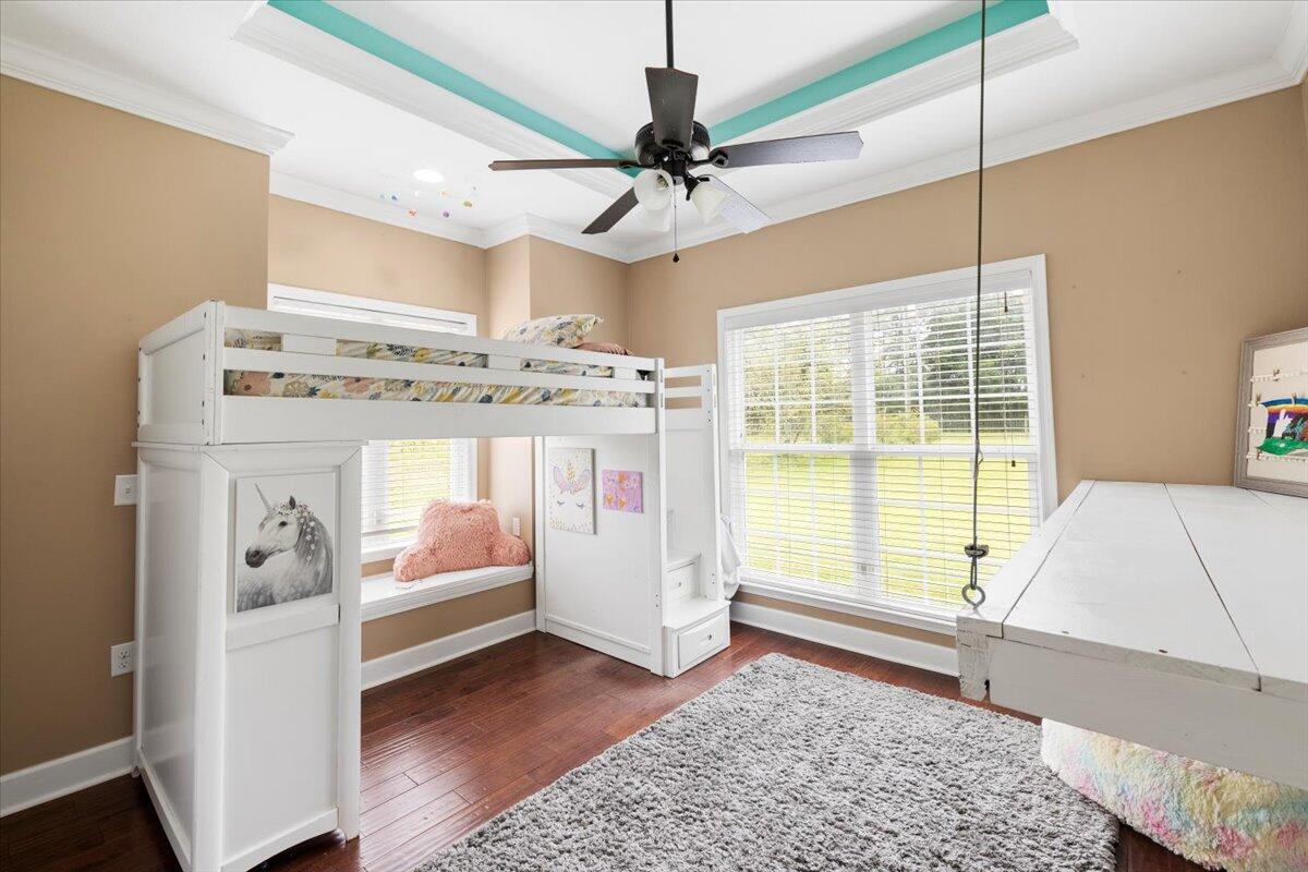 7938 Steel Mill Creek Road Laurel Hill, FL 32567 - Photo 19 of 33 a view of a room with cabinet wooden floor and windows