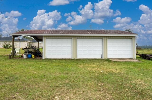 7938 Steel Mill Creek Road Laurel Hill, FL 32567 - Photo 33 of 33 a house view with a garden space